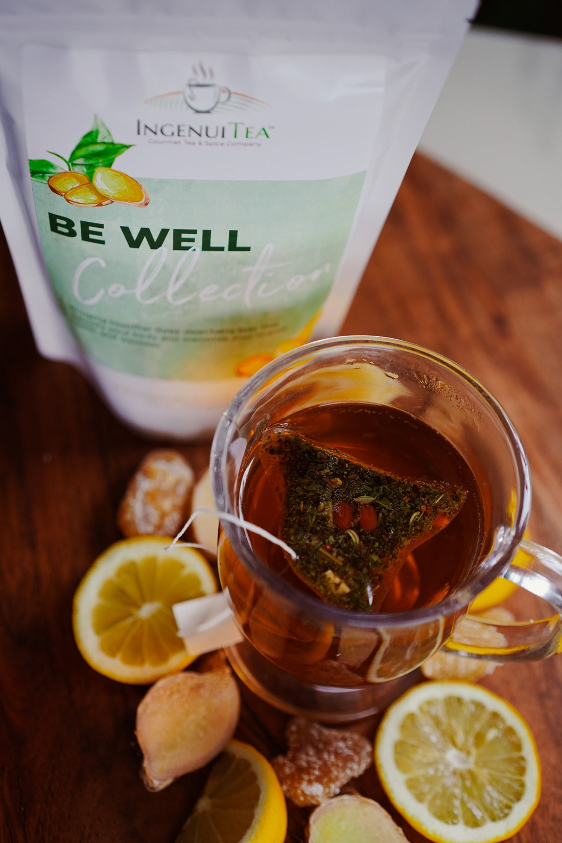 glass of organic brewed tea with tea package