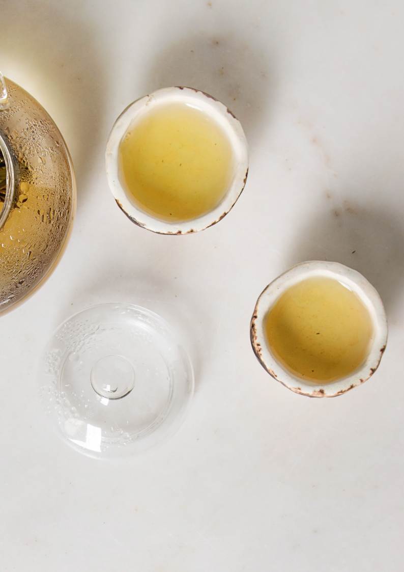 brewed organic tea in small mug