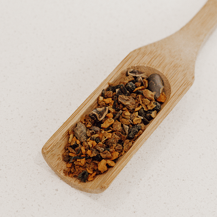 IngenuiTea™ Mayan Moon herbal tea blend on spoon